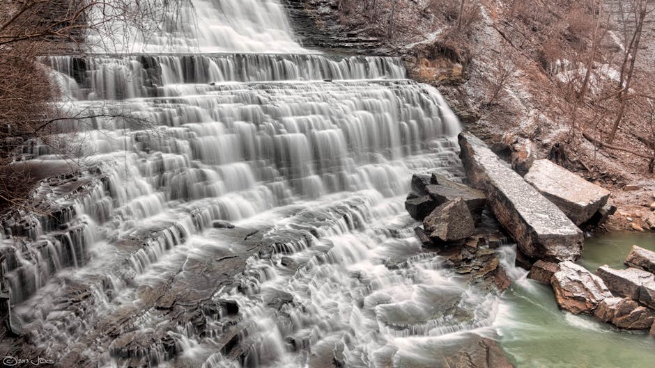 Stunning waterfall in Hamilton, Ontario, showcasing a serene flow over rocky terraces.