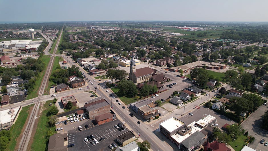 Aerial view of a suburban neighborhood in Windsor, Ontario during summer.
